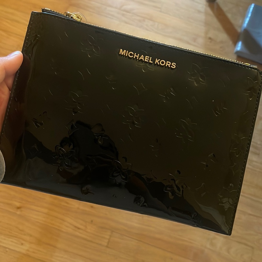 Brand new Micheal Kors travel wristlet